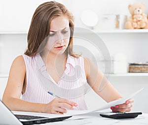Disappointed girl worried about bills