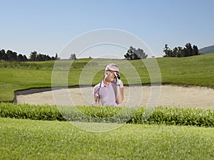 Disappointed Golfer In Sand Trap