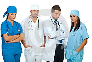 Disappointed team of doctors photo