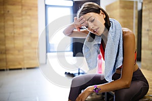 Disappointed tired woman trying to reach fitness goals by endurance and stamina training