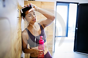 Disappointed tired woman trying to reach fitness goals by endurance and stamina training