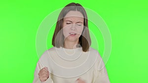 Disappointed Young Woman Reacting Loss on Green Background