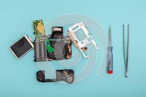 Disassembled camera with tools