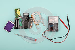 Disassembled camera and tools