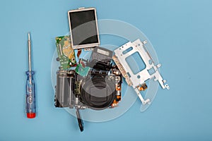 Disassembled camera and tools