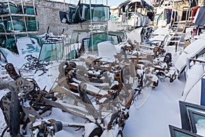 Disassembled cars on a car dump are on sale for spare parts