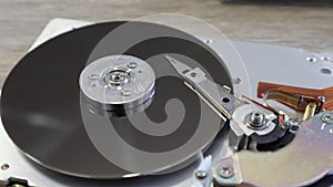 Disassembled computer hard drive. Data hard drive backup disc hdd disk restoration. Disassembled hard drive from the computer, hdd