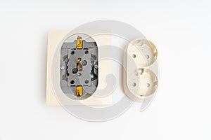 disassembled Double socket insulated on a white background.