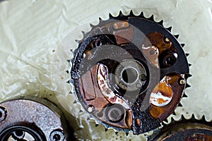 Disassembled gear parts with lubricated machine oil