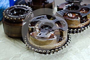 Disassembled gear parts with lubricated machine oil