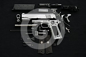 Disassembled handgun.