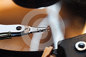 Disassembled hard drive from the computer, hdd with mirror effect Opened hard drive from the computer