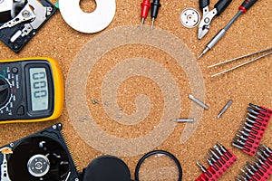 Disassembled hard drive and tools