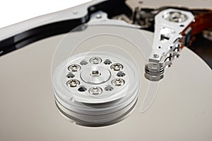 disassembled hard drive on white background, hdd, hard disk drive, close-up, head