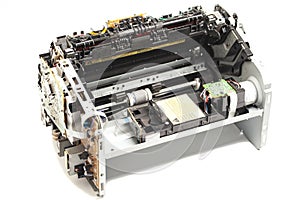 Disassembled laser printer isolated on white background.