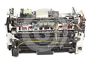 Disassembled laser printer isolated on white background