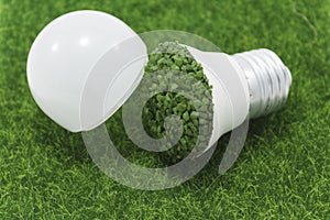 The disassembled LED lamp lies on the lawn