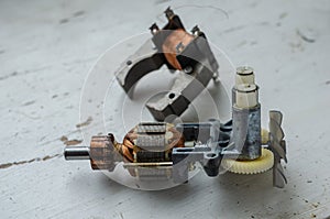 Disassembled motor for used kitchen mixer. photo