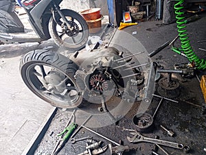 Disassembled motorcycle engine during repair