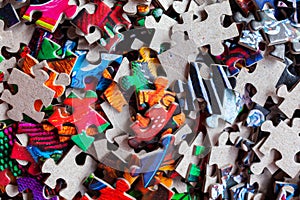 Disassembled puzzle colored pieces