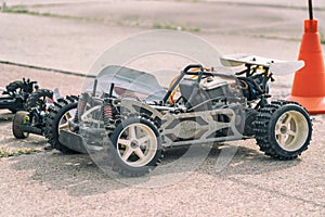 Disassembled RC model racing cars. Model cars without top