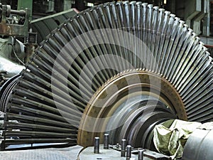 Disassembled steam turbine in the process of generator repair at