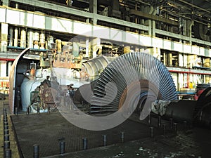 Disassembled steam turbine in the process of generator repair at