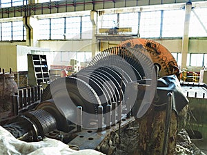 Disassembled steam turbine in the process of generator repair at power plant