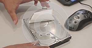 Disassembly of the hard drive on a white background, large shot