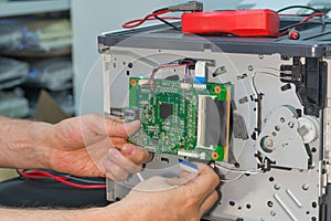 Disassembly of the laser printer for repair.