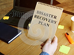 Disaster Recovery Plan in man hands