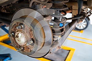 Disc brake of the car during the maintenance at auto service