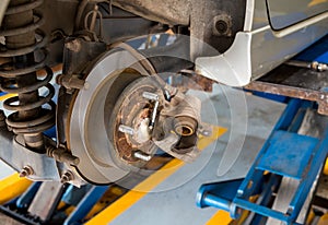 Disc brake of the car during the maintenance at auto service