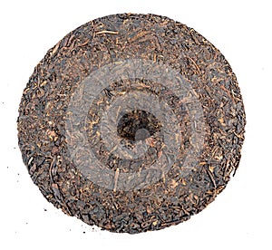 Disc of chinese puer tea on white background