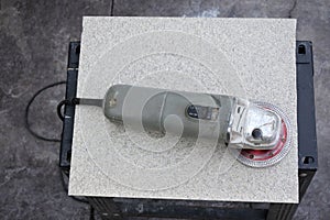 Disc Cutter Power Tool on a Ceramic Tile