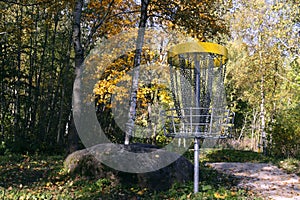 Disc golf, sports and hobbies in outdoor. Beautiful game. Autumn morning