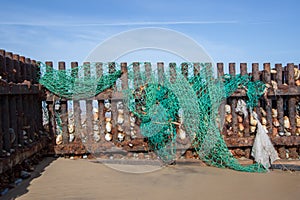 Discarded fishing net. Evironmental sea pollution threat to wild