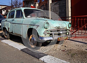 Discarded old grungy car