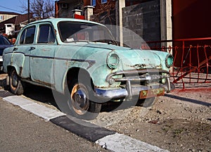Discarded old grungy car photo