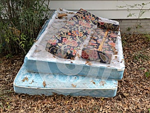 Discarded pile of derelict mattresses