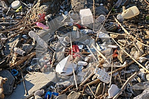 Discarded plastic debris garbage pollution on contaminated ocean sea coast ecosystem,environmental waste