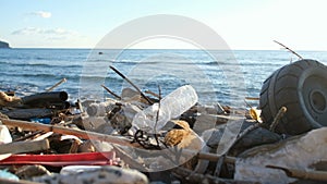 Discarded plastic trash pollution on contaminated ocean sea coast ecosystem,environmental waste