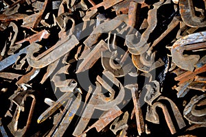 Discarded railroad spikes and anchors