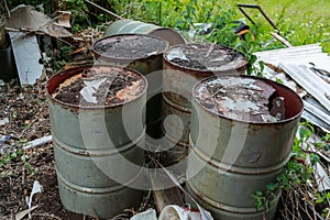 Discarded and rusted oil drums pollution