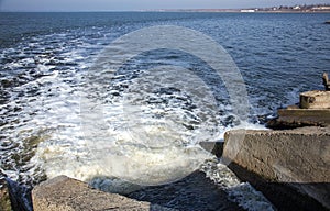 Discharge of dirty industrial wastewater into sea. Poisoning of recreation area by spread of disease, destruction of flora and