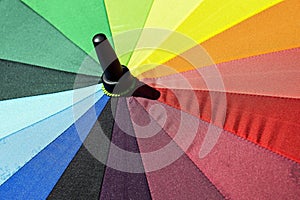 The disclosed bright colorful umbrella