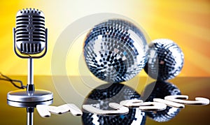 Disco Ball, Microphone, music saturated concept