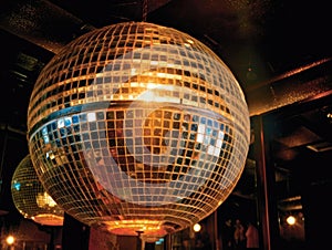 Disco ball reflects colorful lights