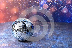 Disco balls with bright rays, night party background