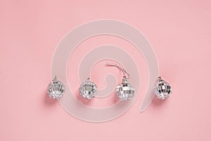 Disco balls on pink background. 90s retro party concept. difference concept